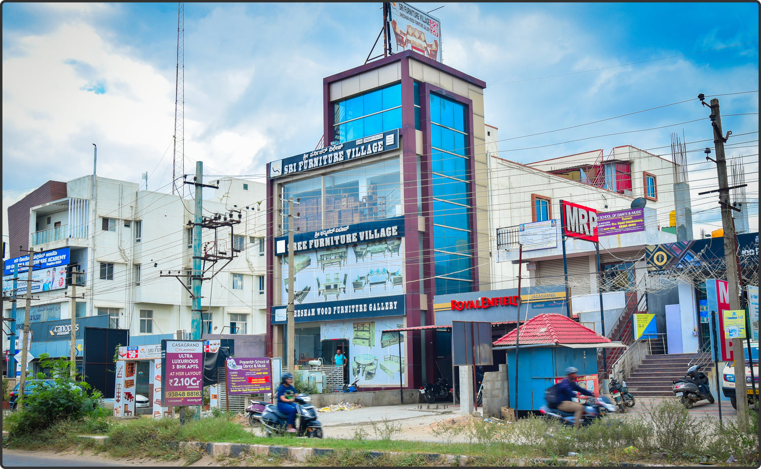Sri Furniture Village Bengalru showroom showcasing handcrafted Sheesham wood furniture